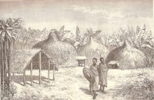 Pueblo de Machame en las laderas del Kilimanjaro, con dos aldeanos, uno con lanza y escudo, frente a cabañas y refugios con techo de paja, dibujados por Mons. Le Roy