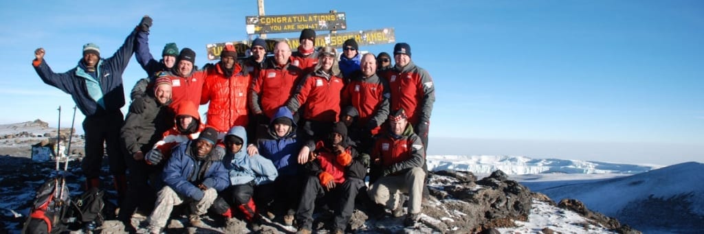Group of 12 Scots at Kilimanjaro's Uhuru Peak